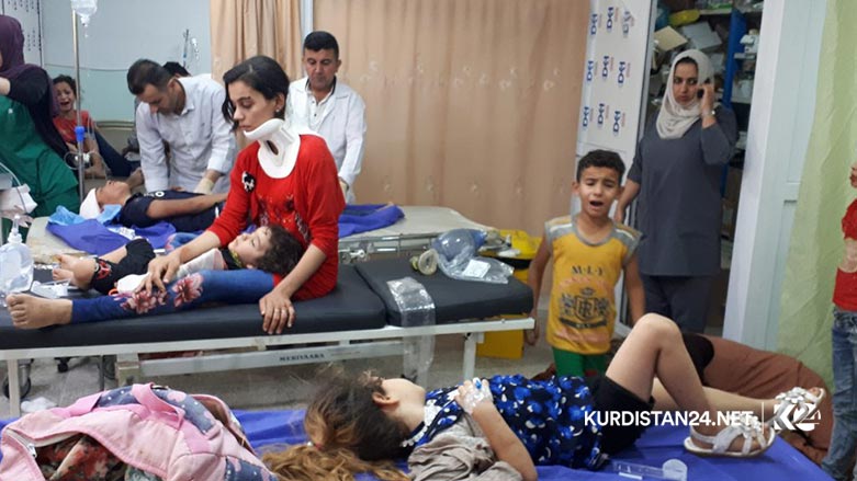 A mini bus carrying two Iraqi tourist families drove off a mountainous road in the Kurdistan Region, killing and injured tens of people  Aug. 30, 2019. (Photo: Kurdistan 24/Karwan Yara)